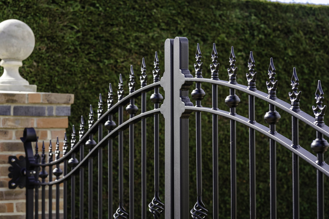 Quality ironwork detail on electric entrance gates installed by our engineers